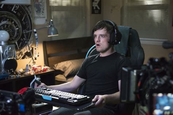 Future Man - Josh playing a video game with a joystick and keyboard and mouse