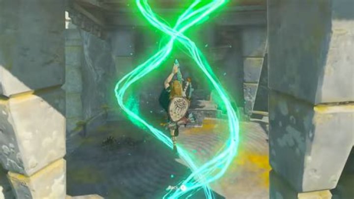 Link using the Ascend ability in The Legend of Zelda: Tears of the Kingdom, flying upward with a glowing green helix swirling around him