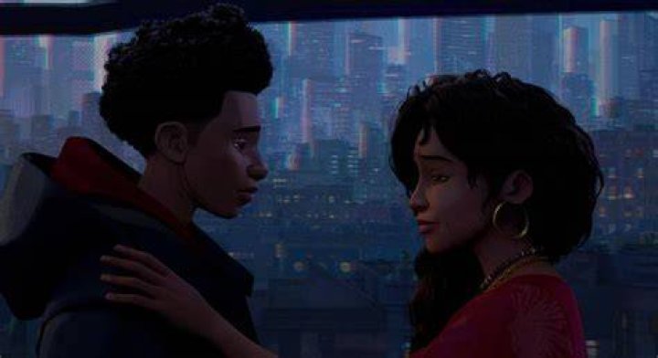 Miles Morales has a quiet moment with his mother Rio against a background of the New York City skyline in Spider-Man: Across the Spider-Verse