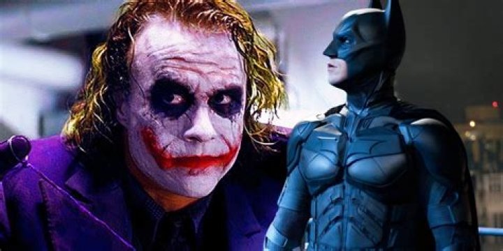 The Dark Knight - Batman standing in flames